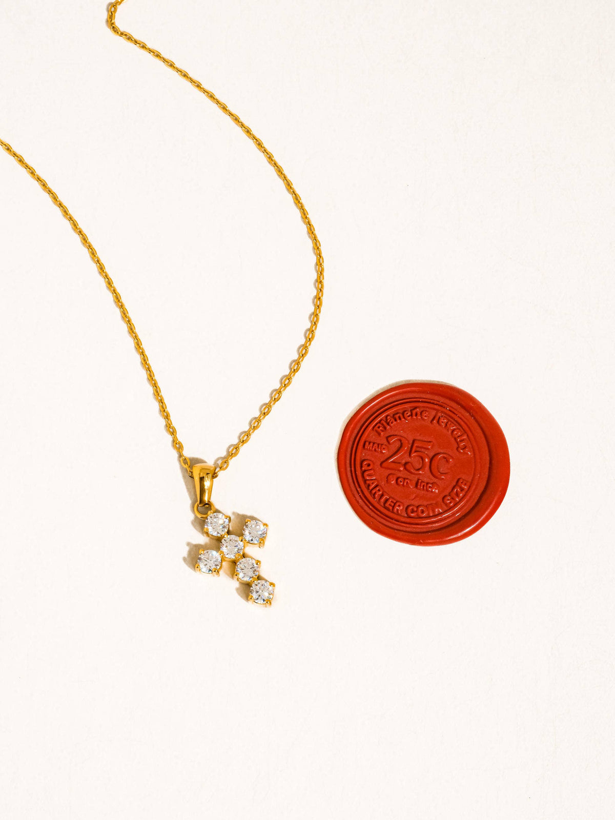 RAIMONA CROSS NECKLACE
