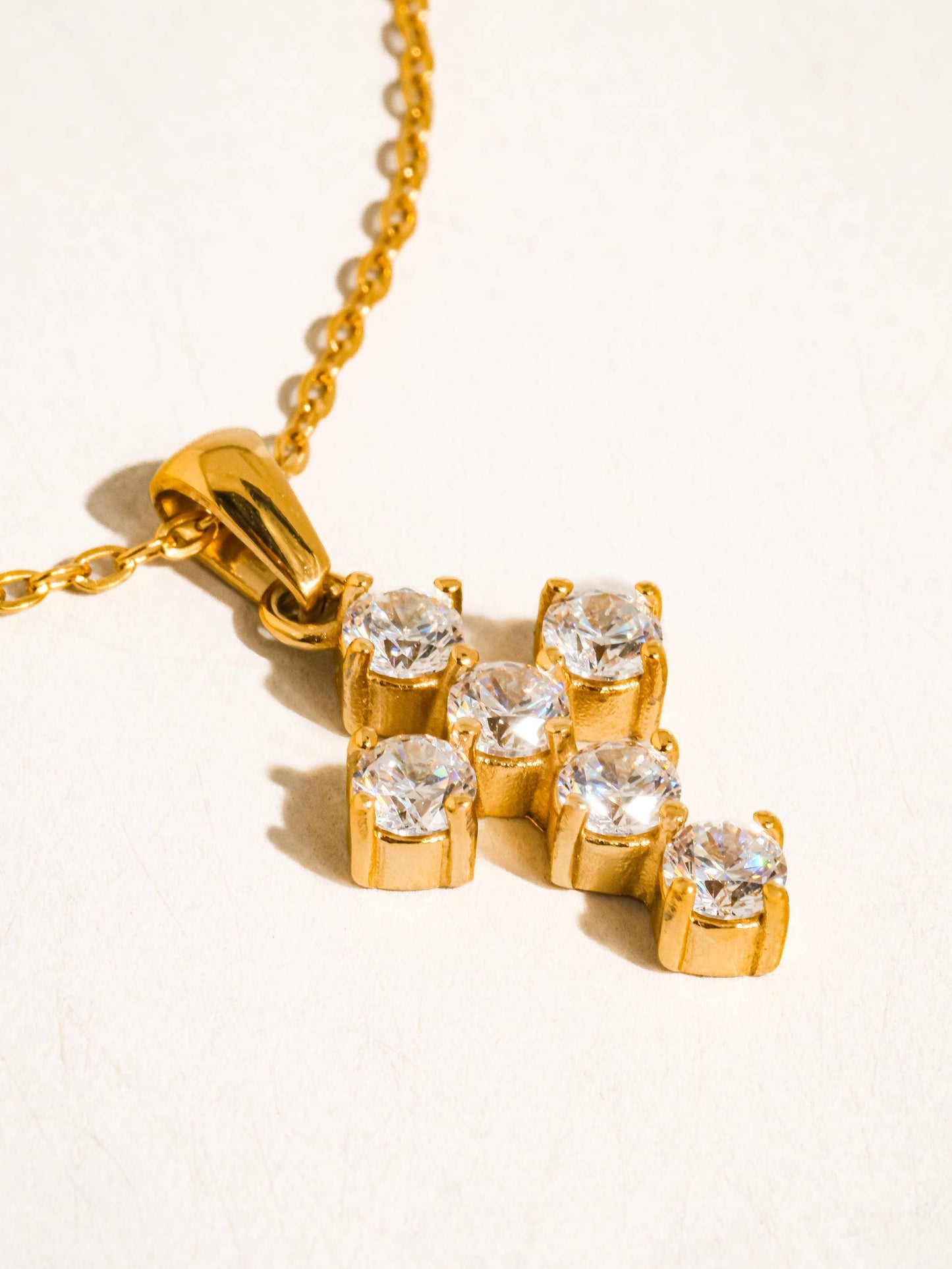 RAIMONA CROSS NECKLACE